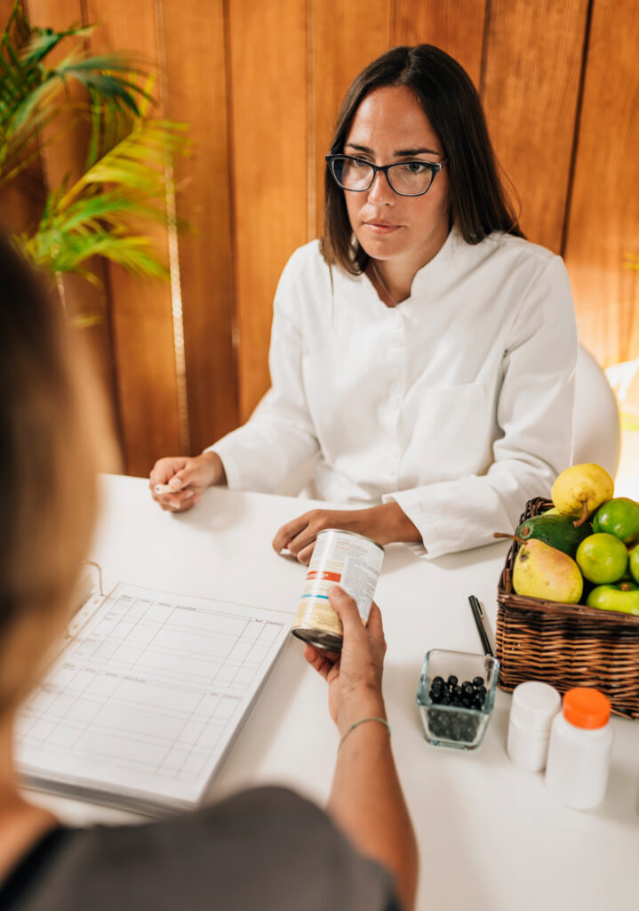 Nutritionist Talking with Patient at Weight Loss Clinic