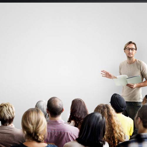 Guy giving a presentation to an audience